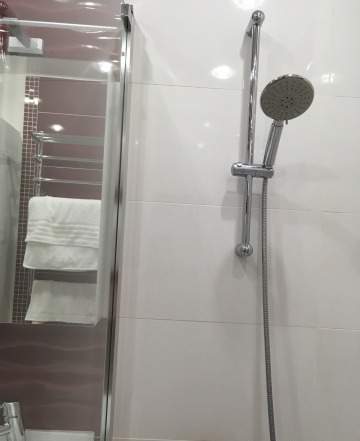 Стеклянная штора для ванной